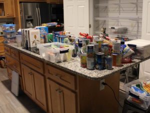 Organizing the pantry starts with clearing out all the junk