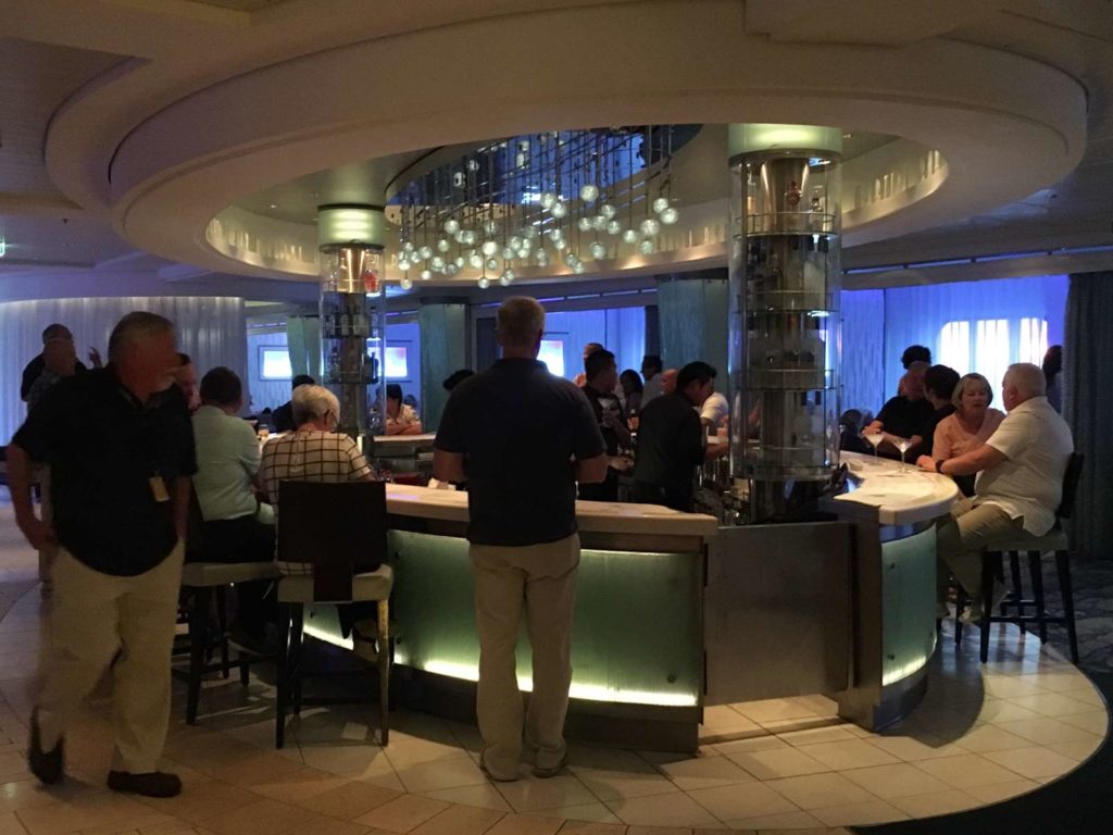 People at a bar on the Celebrity Equinox