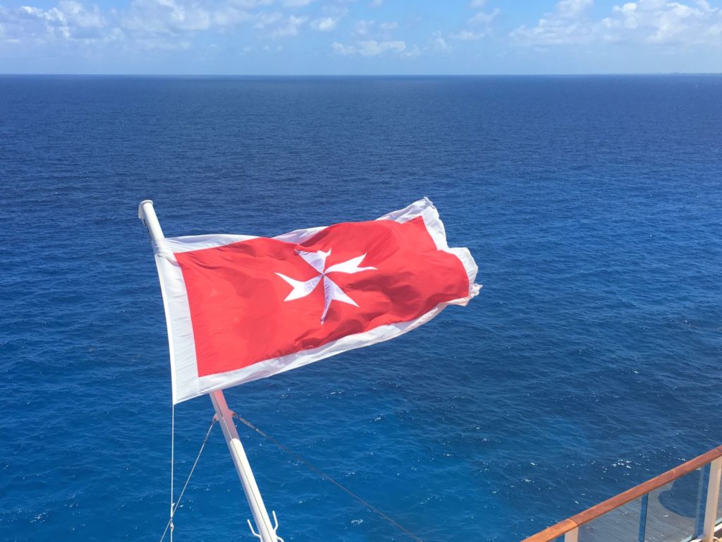 Ship's flag over the sea