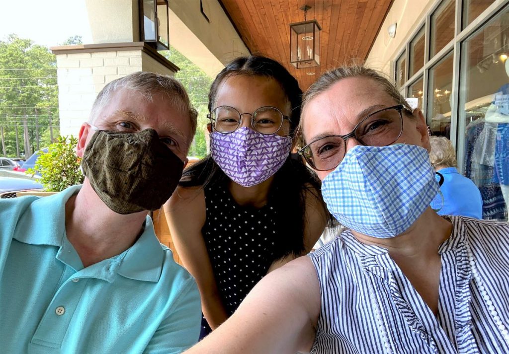 Outdoor dining at a restaurant with our masks before food arrived.