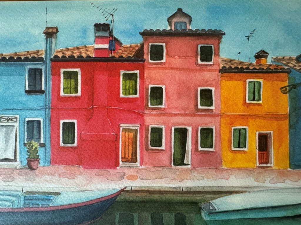 Watercolor painting showing buildings, reflection in the water and a boat.