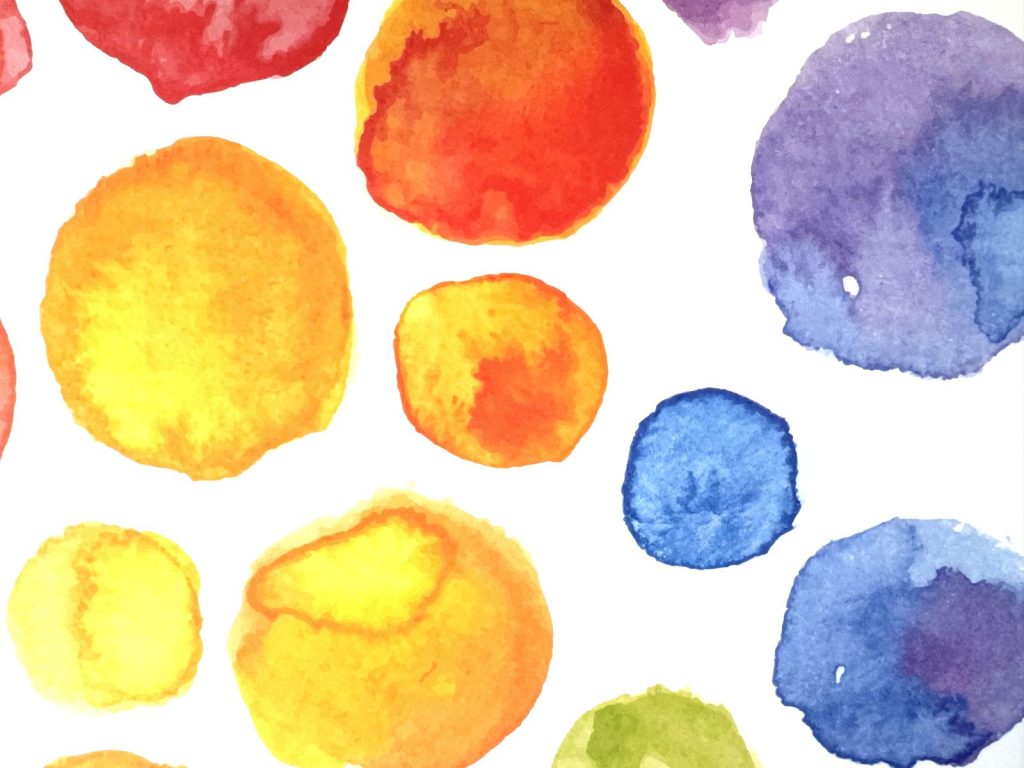 Watercolor painting circles in different colors and color combinations.